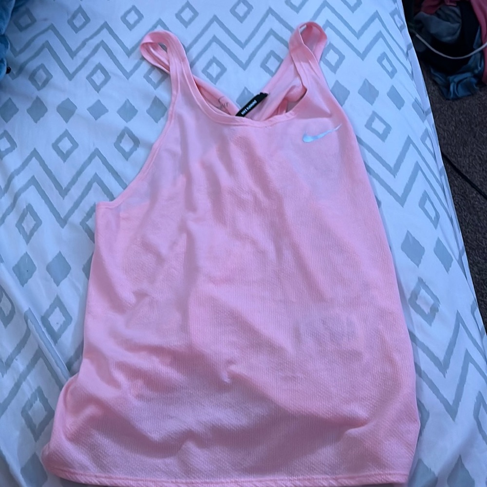 pink open back nike tank